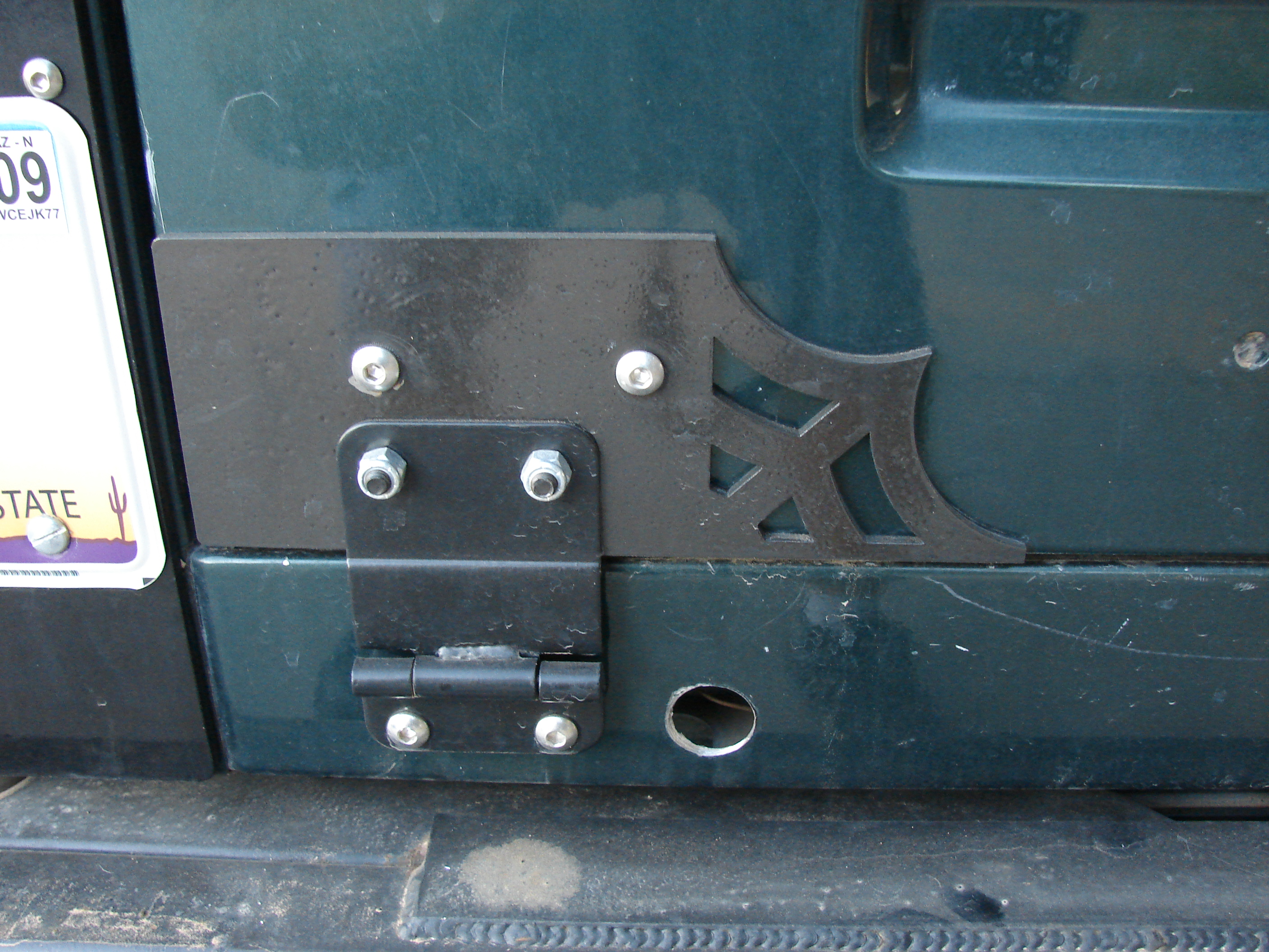 Note the 1 inch hole to insert the nut plate
